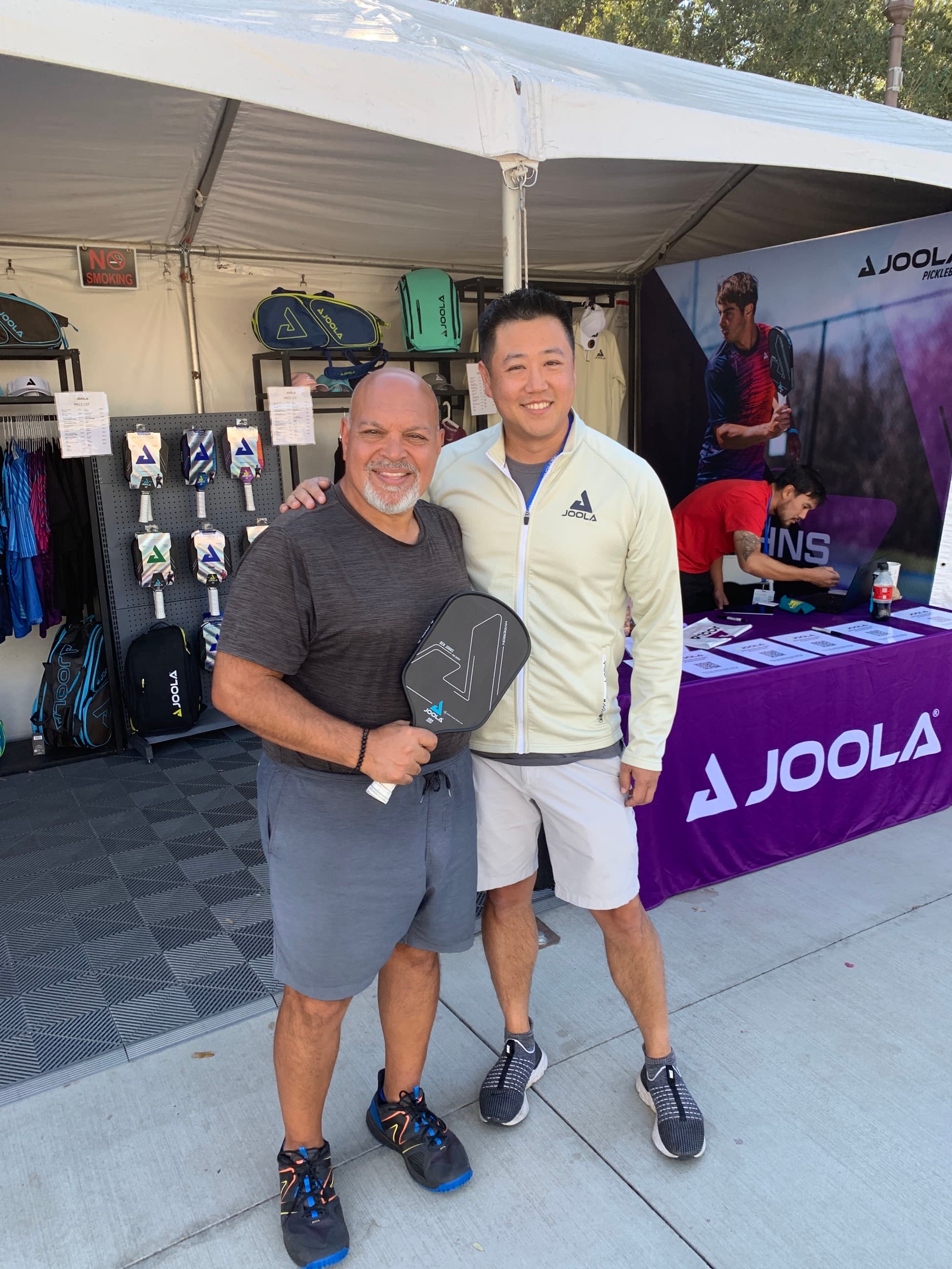 Coach Tobin at the JOOLA booth during a tournament weekend.